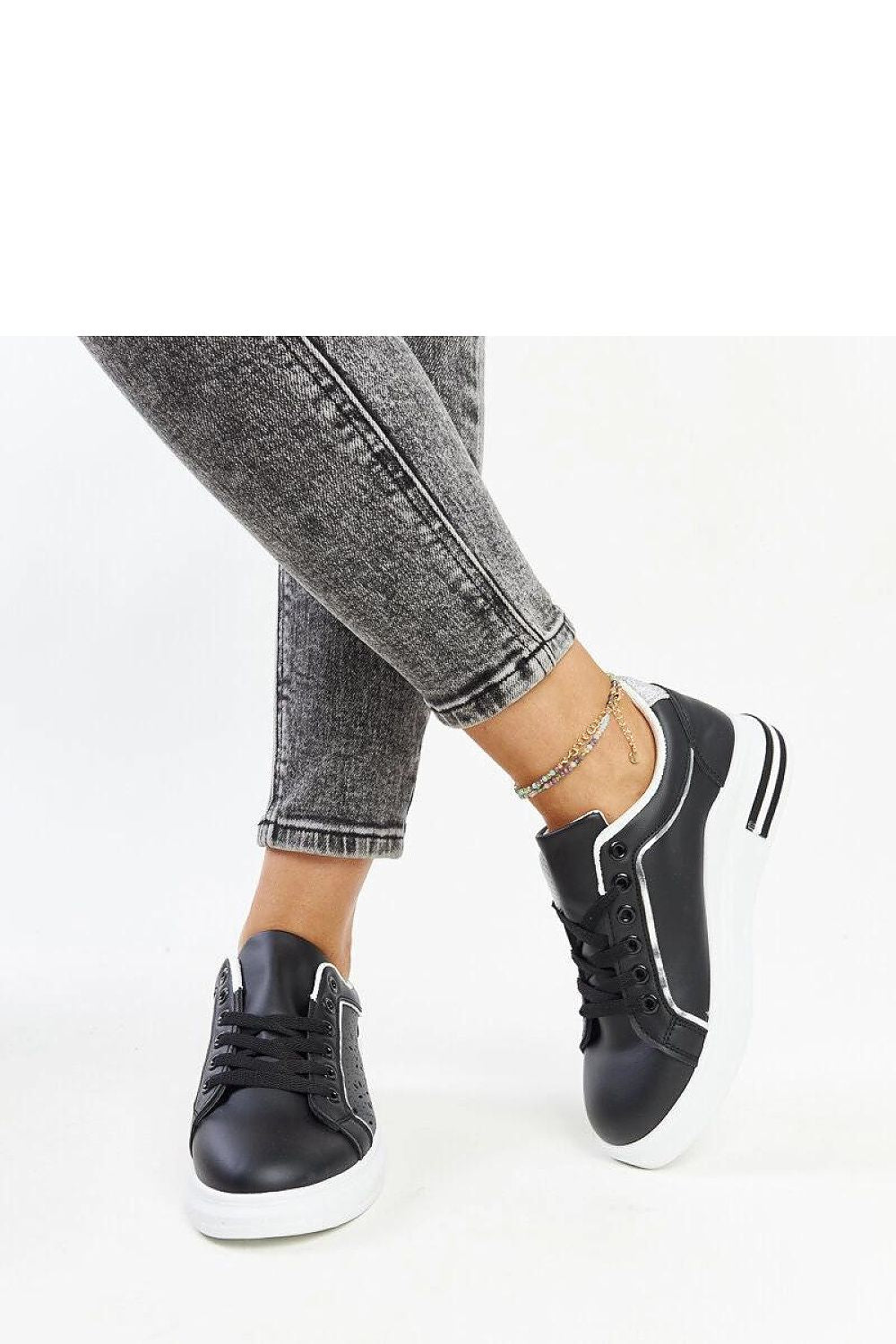 Chic Rubber Solea Glitter Sneakers in black, combining sustainability and glamour for modern footwear lovers.