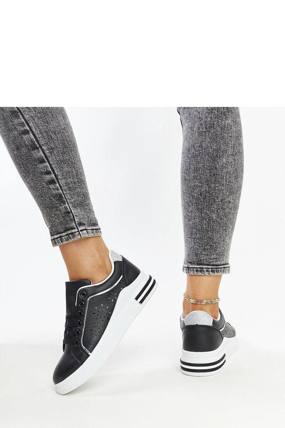 Distinctive Solea Eco-Leather Sneakers featuring glitter embellishments, perfect for making a statement in any outfit.