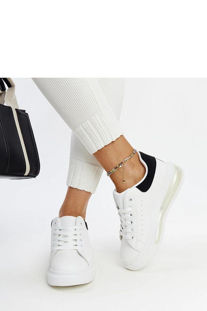 Solea White High Sole Sneakers Zrina displayed in various sizes EU 36-41, showcasing their chic design and versatility for refined outfits.