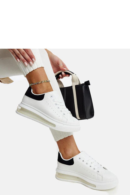 Flat lay of Solea White High Sole Sneakers Zrina, featuring its white rubber sole and fashionable silhouette ideal for modern sportswear.