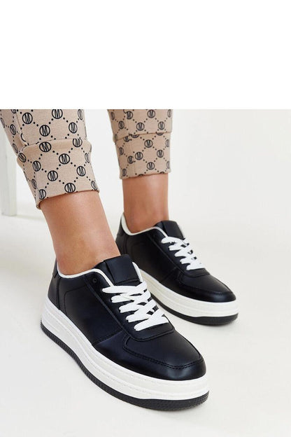 Solea luxurious black platform sneakers featuring elegant faux leather design with lace-up closure and round toe, perfect for stylish outfits.