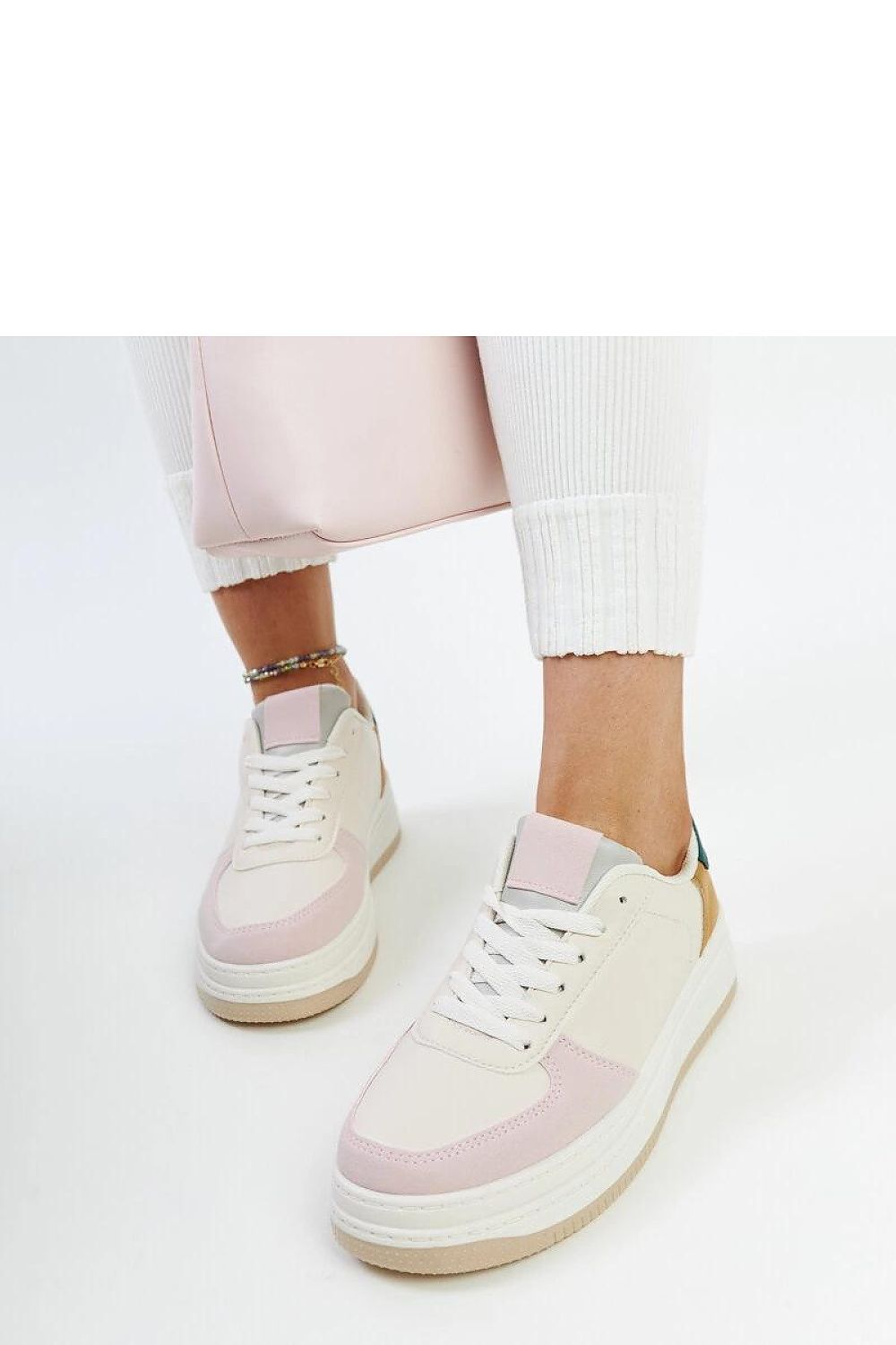 Solea Cvita platform sneakers side view highlighting medium heel and round toe for a chic silhouette