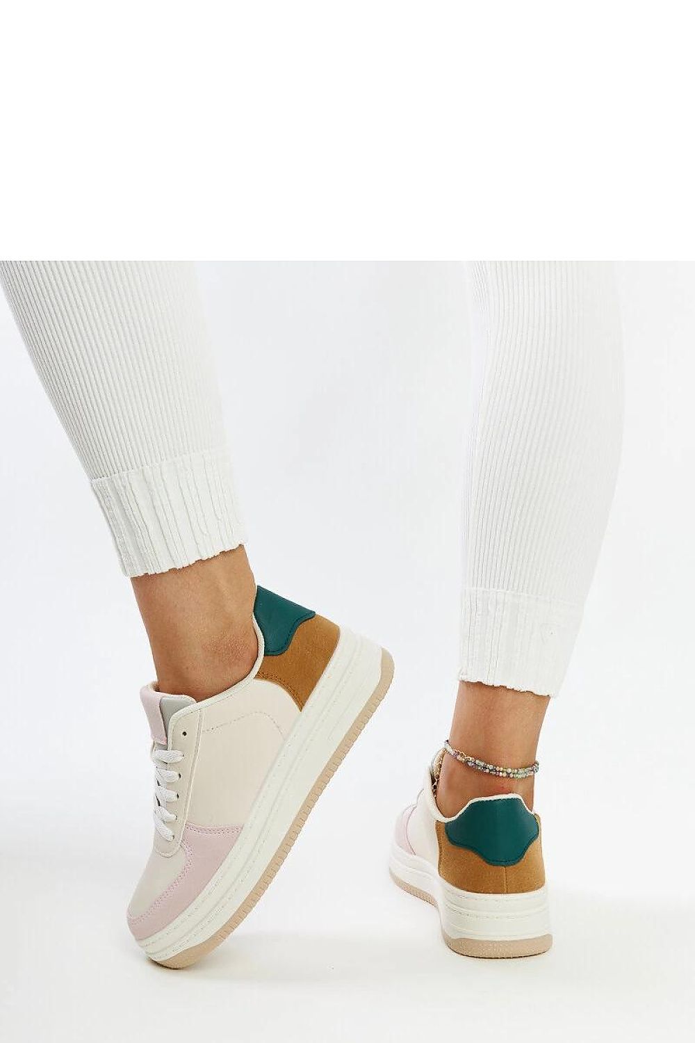 Solea black platform sneakers presented on a stylish surface, accentuating their luxe design and appeal