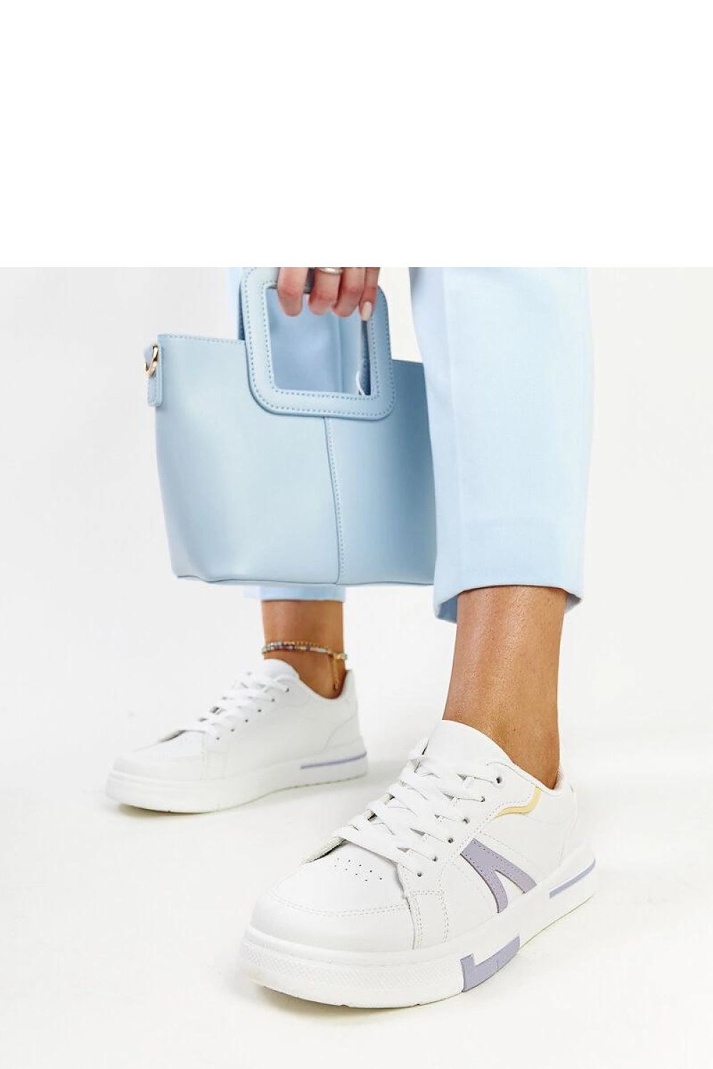 Versatile Adidas Solea Sneakers in White Zorica, embodying sophisticated style for both casual and refined outfits.