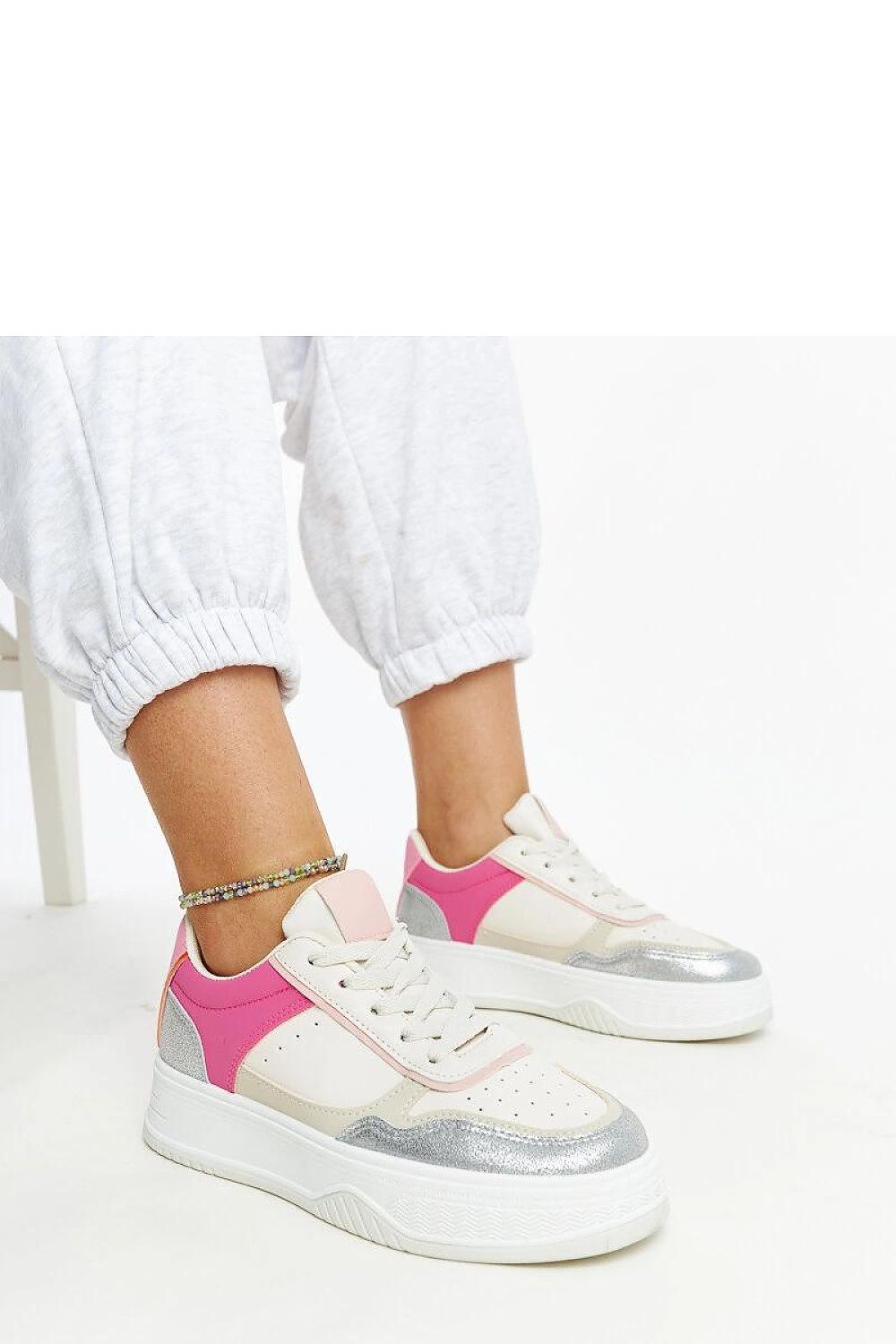 Luxury chunky soled white and pink sneakers by Solea, crafted from eco leather, showcasing modern urban style and exceptional comfort.