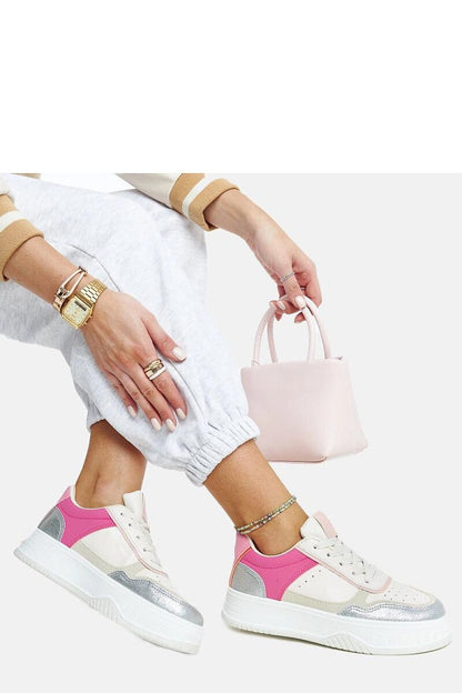 Close-up view of Solea's eco leather chunky soled sneakers in white and pink, highlighting quality craftsmanship and chic fashion appeal.