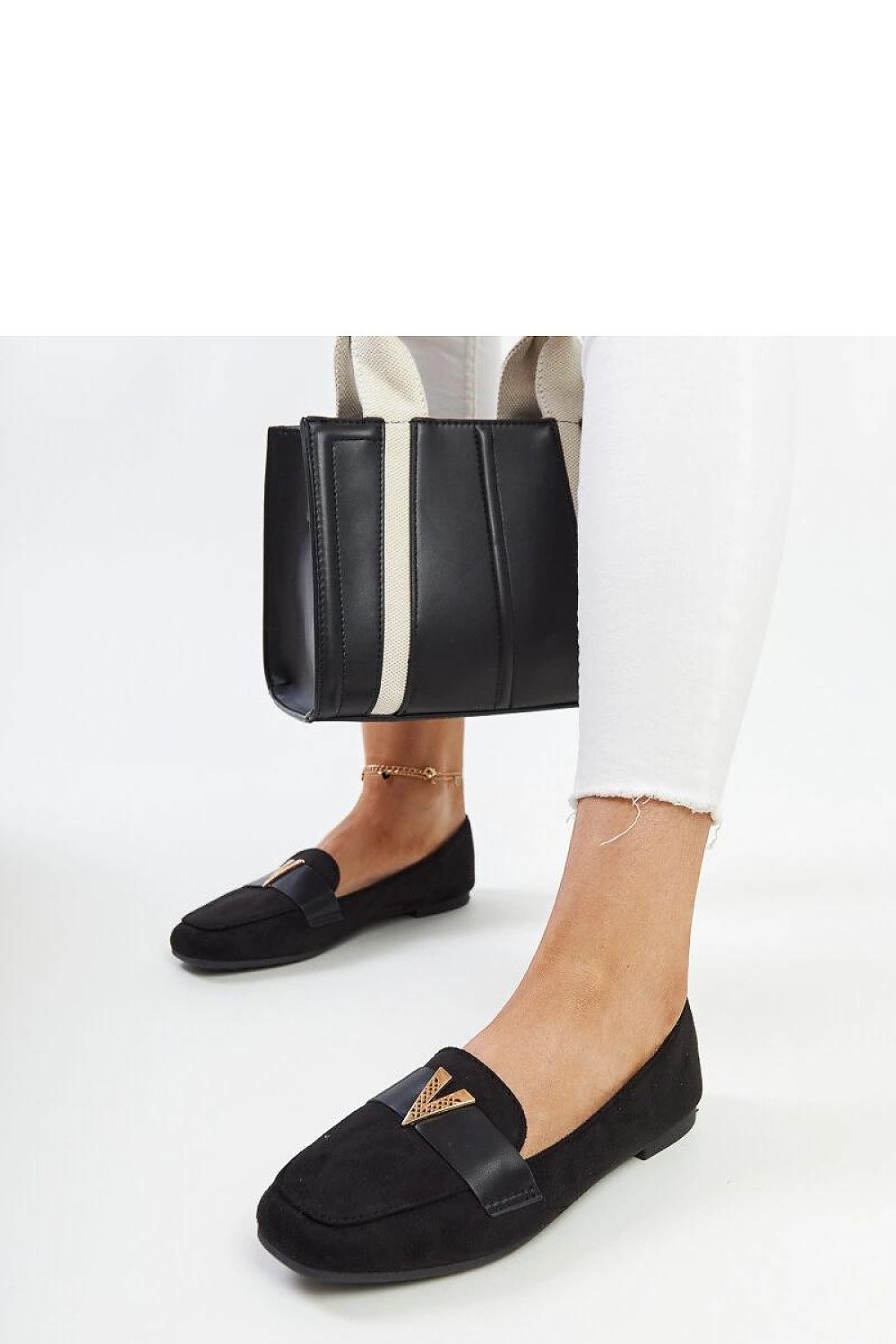 Elegant black moccasins with slip-on style by Solea, showcasing unique Namal decoration for a luxurious daily wear option.