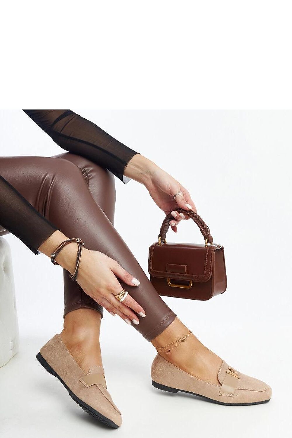 Luxury black moccasins by Solea featuring unique Namal decoration, crafted from eco leather for a stylish slip-on design.