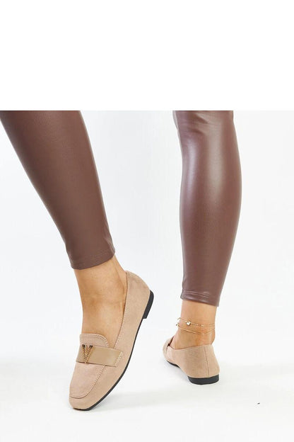 Elegant Solea black moccasins with rounded toe and rubber sole, perfect for adding comfort and style to any outfit.