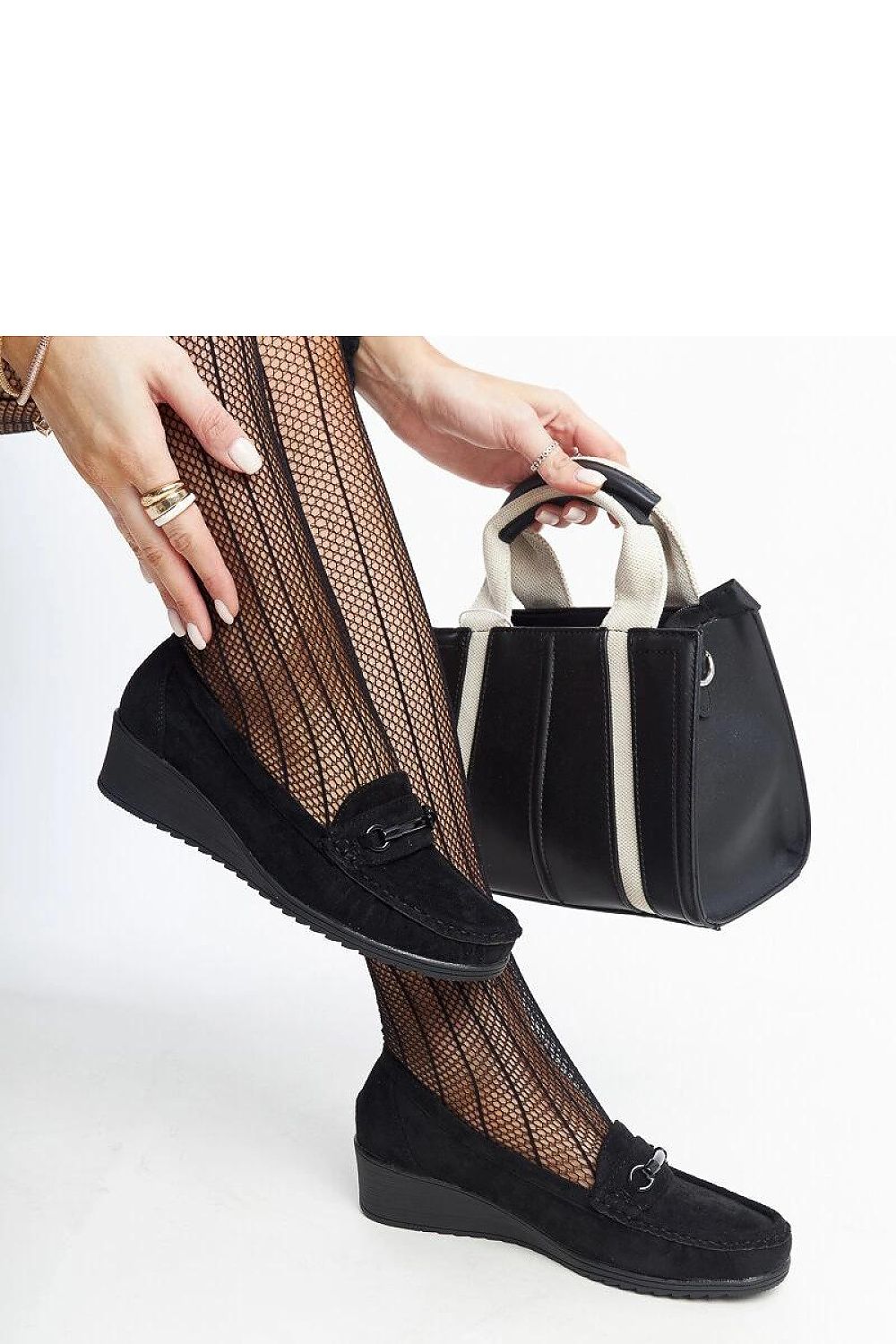 Solea Amela luxury black wedge moccasins featuring a comfortable rubber sole and eco leather upper, ideal for a stylish and practical addition to your wardrobe.