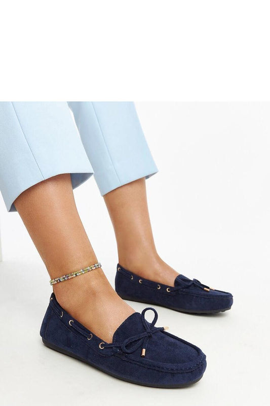Luxurious navy blue suede moccasins for women by Solea, showcasing slip-on comfort and stylish design, perfect for everyday elegance.