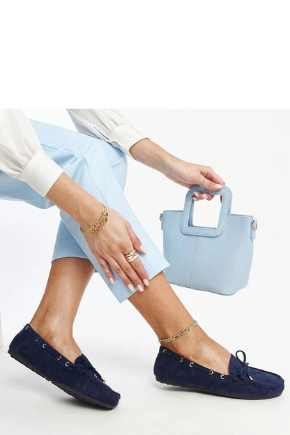 Elegant navy blue suede moccasins from Solea, featuring a flat rubber sole and almond-shaped toe, ideal for fashionable casual wear.