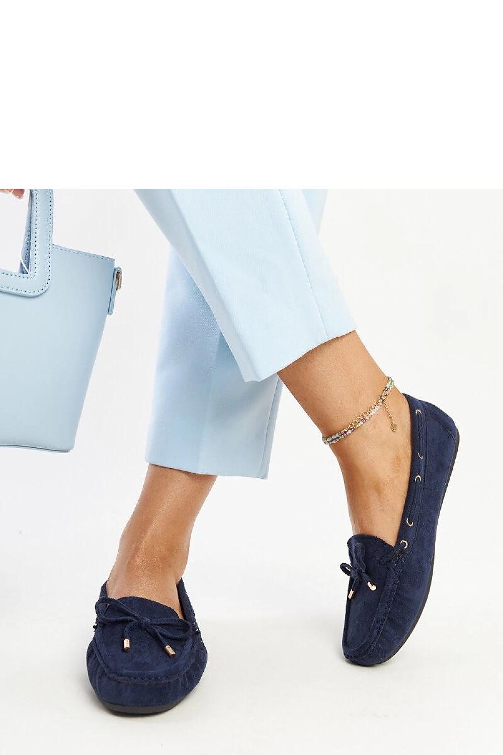 Luxurious navy blue suede moccasins for women by Solea, featuring a stylish slip-on design perfect for elegant everyday wear.