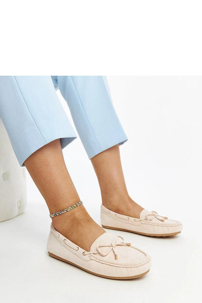 Elegant Solea moccasins in navy blue, ideal for casual and formal occasions, blending comfort with high-fashion aesthetics.