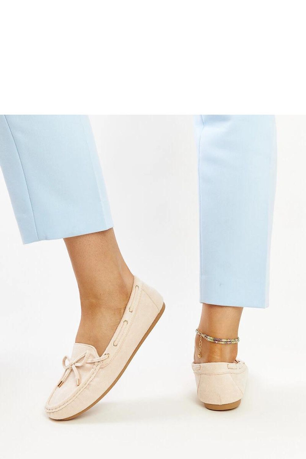 Solea's luxurious navy blue suede moccasins showcasing a comfortable flat rubber sole and eco-friendly materials for sophisticated everyday wear.