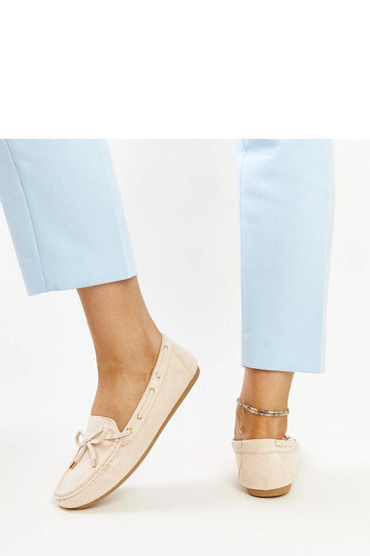 Solea's luxurious navy blue suede moccasins showcasing a comfortable flat rubber sole and eco-friendly materials for sophisticated everyday wear.