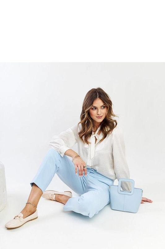 Close-up view of Solea light beige moccasins crafted from high-quality rubber, highlighting the stylish smooth pattern and durable construction.