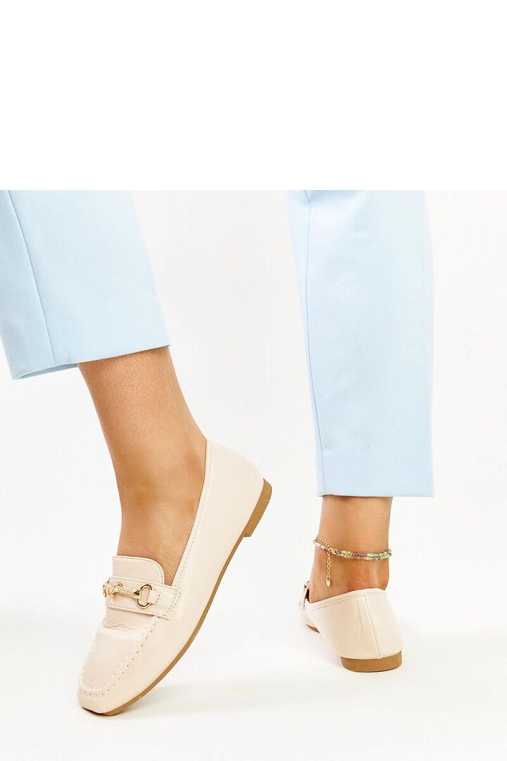 Stylish Solea moccasins showcasing a smooth pattern and durable rubber outsole, perfect for a refined summer look.