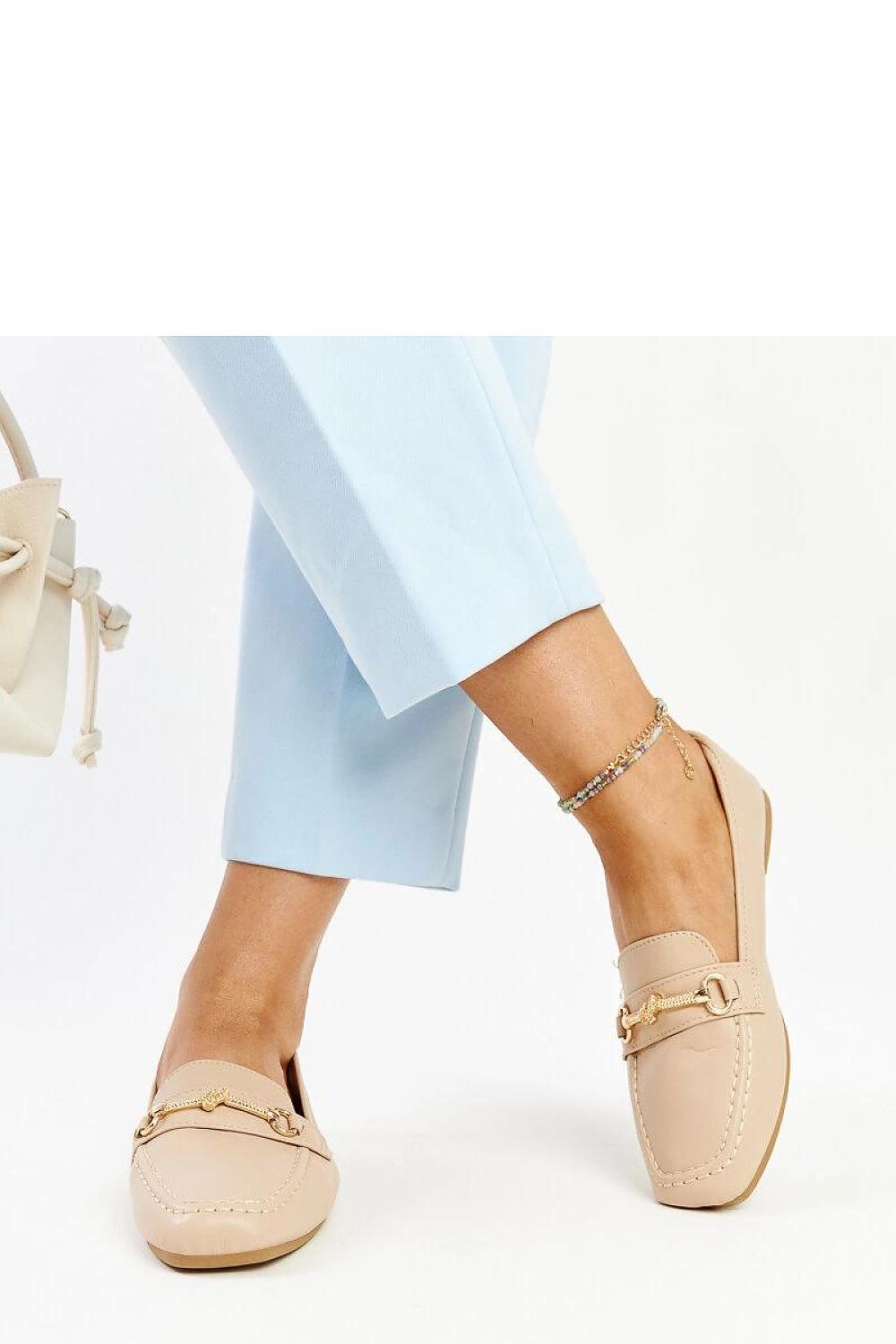 Elegant Solea light beige slip-on moccasins crafted from high-quality rubber, offering unmatched comfort and durability for stylish summer outings.