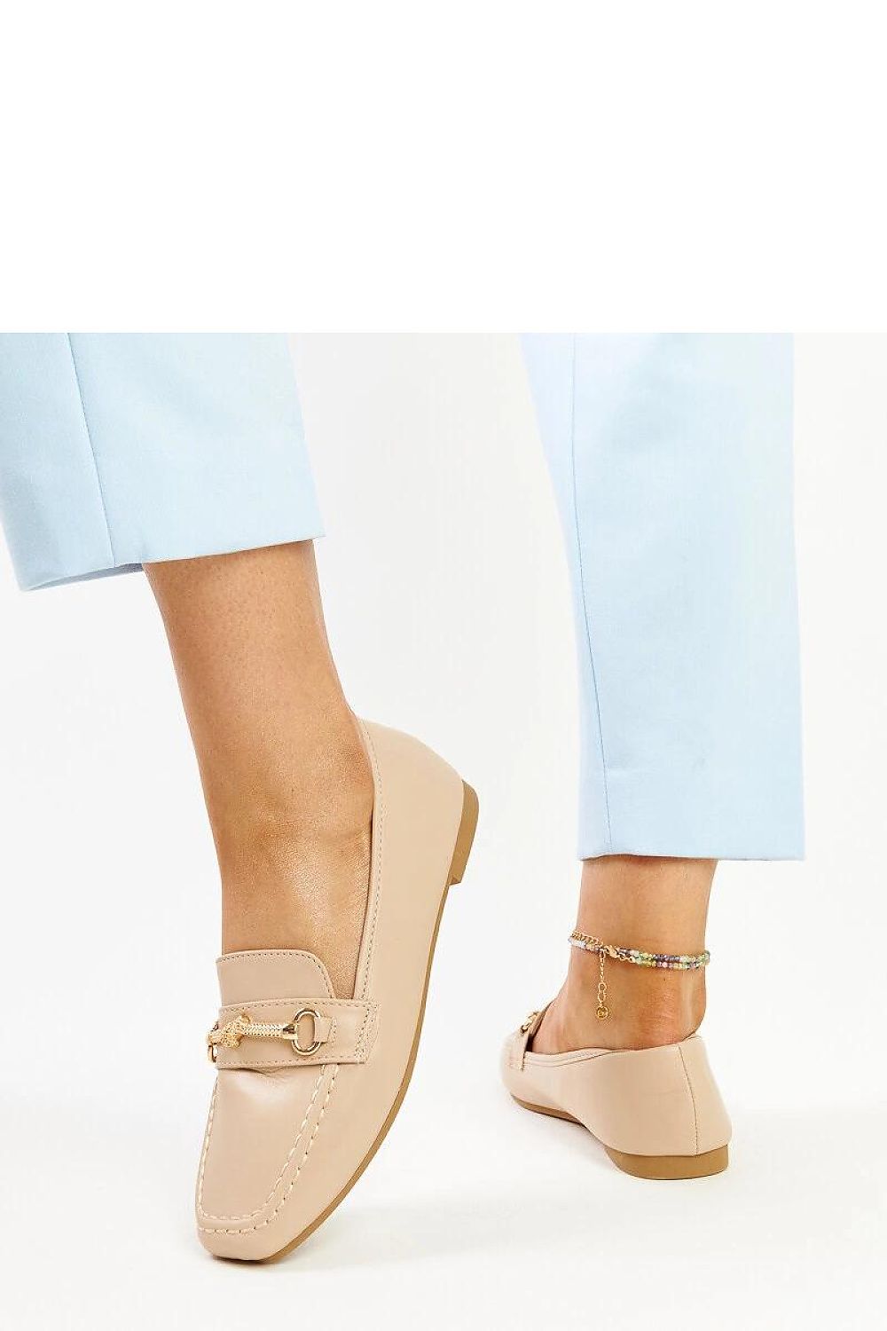 Chic Solea light beige moccasins featuring a smooth pattern and versatile style, ideal for pairing with any summer outfit.