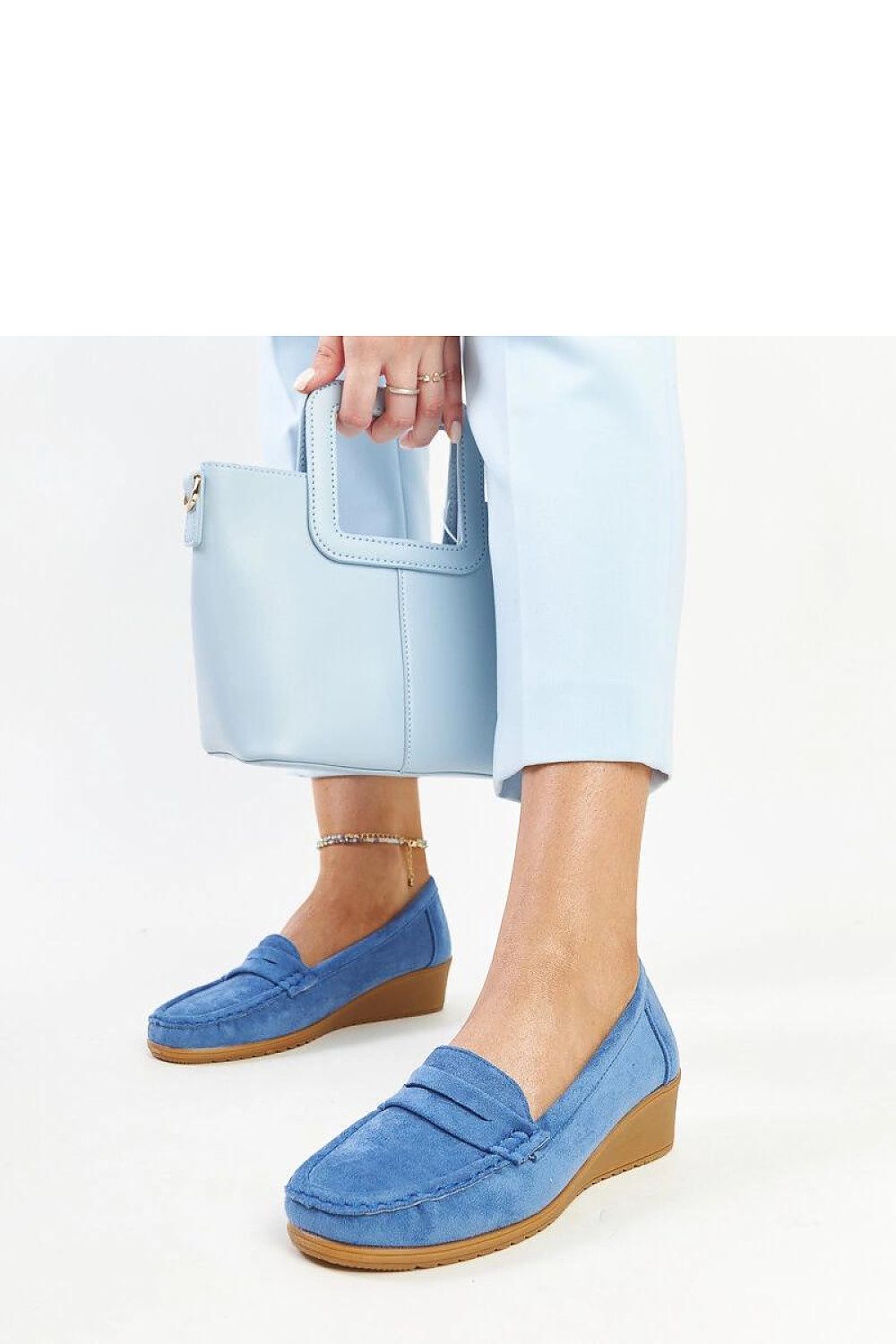 Elegant blue suede wedge loafers Sakena by Solea, showcasing a stylish slip-on design and almond-shaped toe.