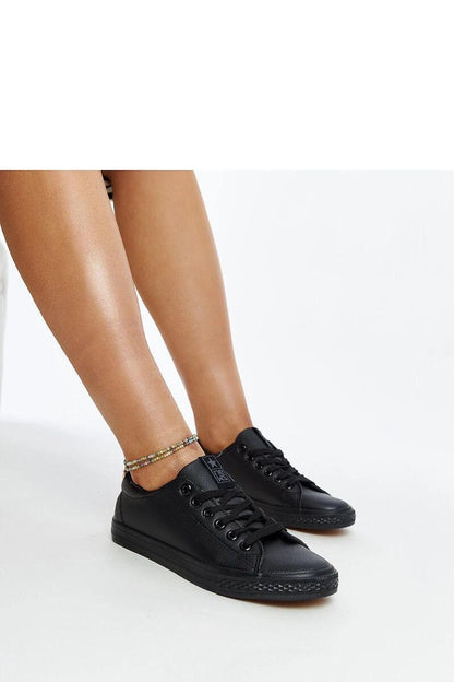 Luz Black eco-leather sneakers for women by Solea, showcasing stylish lacing and a comfortable rubber sole.