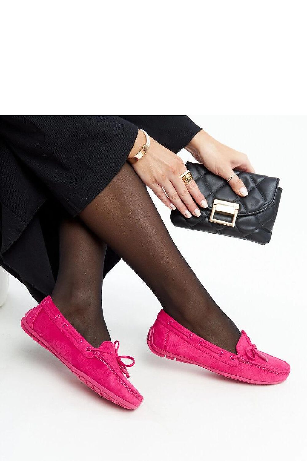 Luxurious dark pink moccasins by Solea, showcasing elegant bow details and eco-leather material, ideal for chic spring/summer outfits.