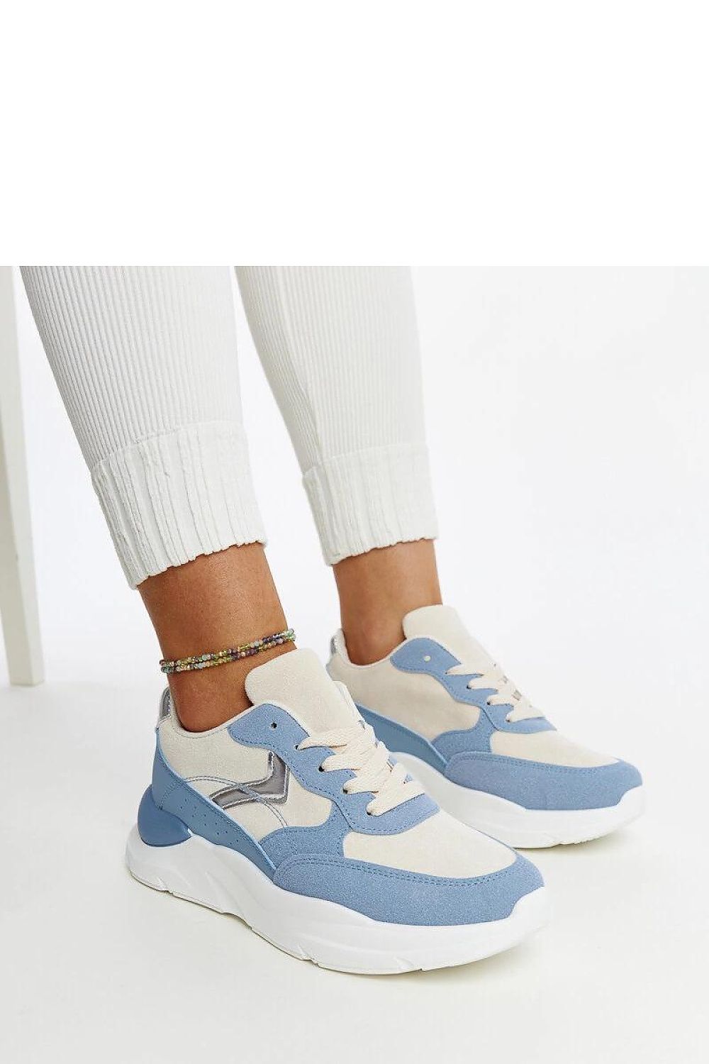 Close-up of Solea's brown eco-leather platform sneakers Nereida, highlighting the high-quality material and chic lace-up detail.