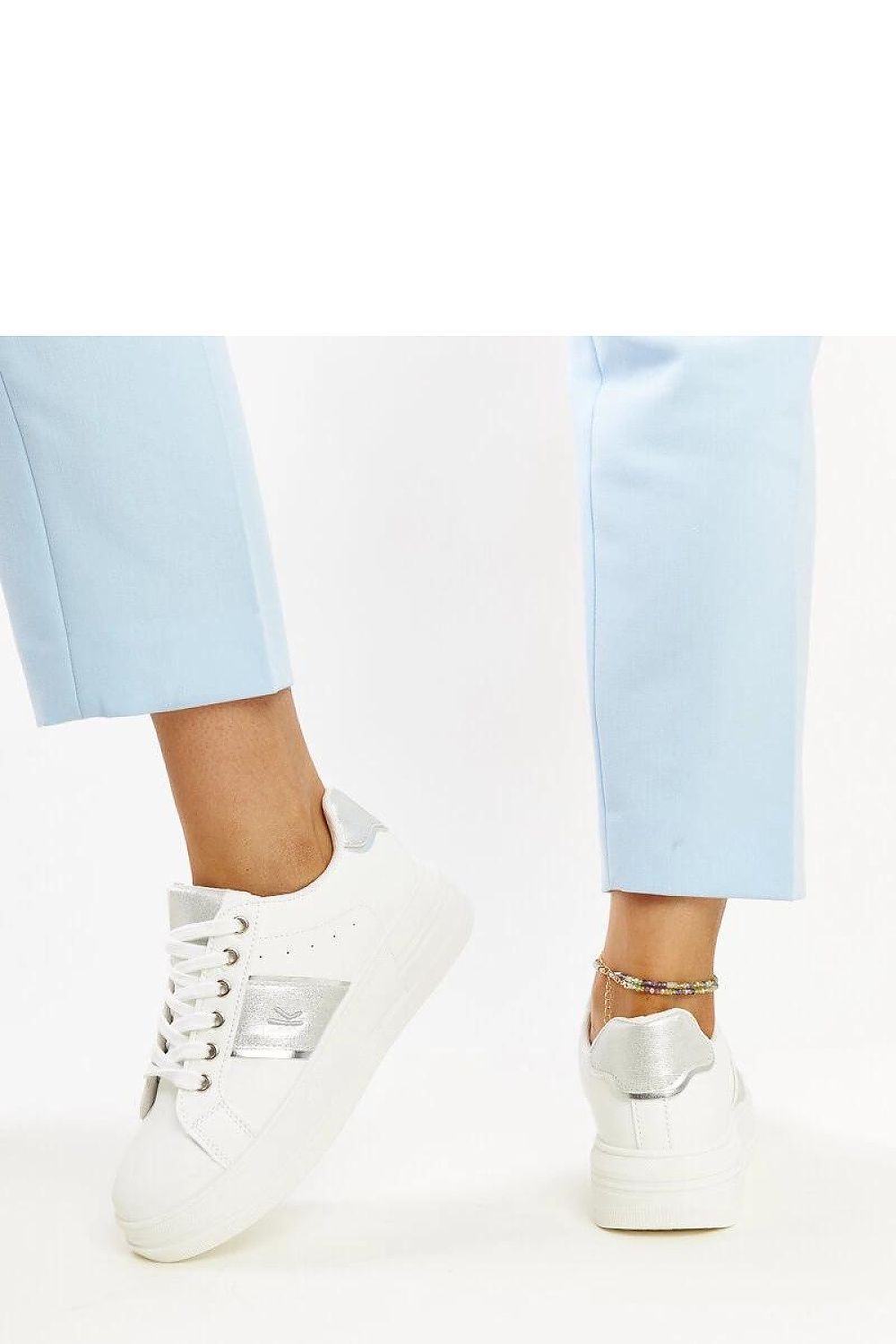 Side profile of Finestra White & Silver Sneakers by Solea displaying the chic rounded toe and thicker sole.