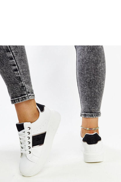 Close-up view of the luxurious Finestra white and silver sneakers from Solea showcasing high-quality suede eco-leather and lace-up closure.