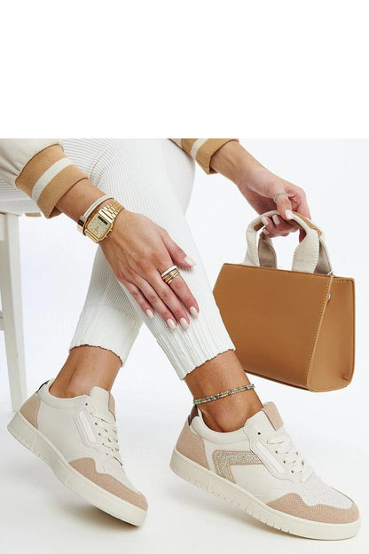 Solea glitter sneakers in black and white, modeled on a foot, illustrating luxurious comfort and trendy design suitable for spring/summer.