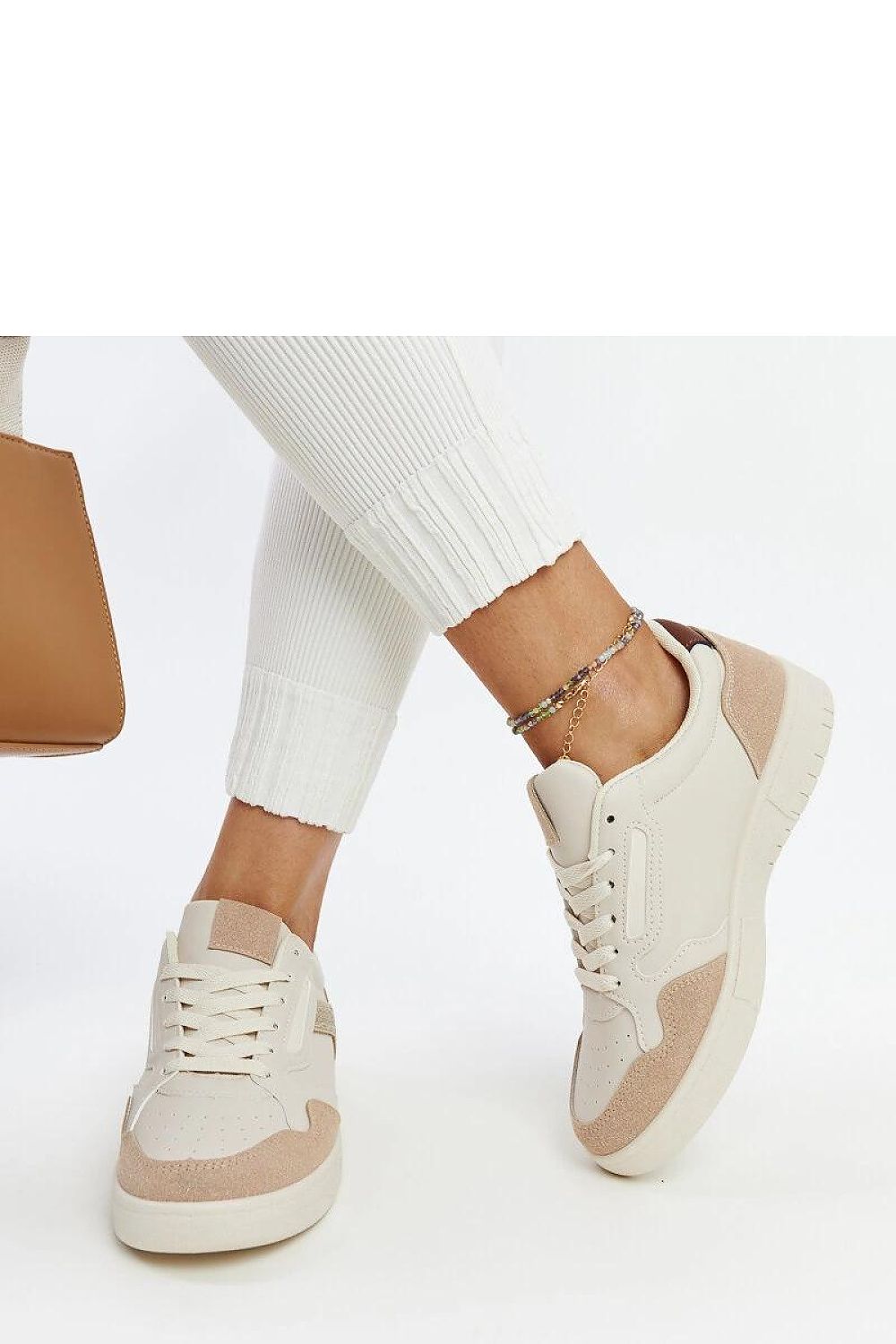 Elegant Solea black-and-white glitter sneakers for women, showcasing luxurious eco-friendly leather and stylish laces, perfect for any fashionable occasion.