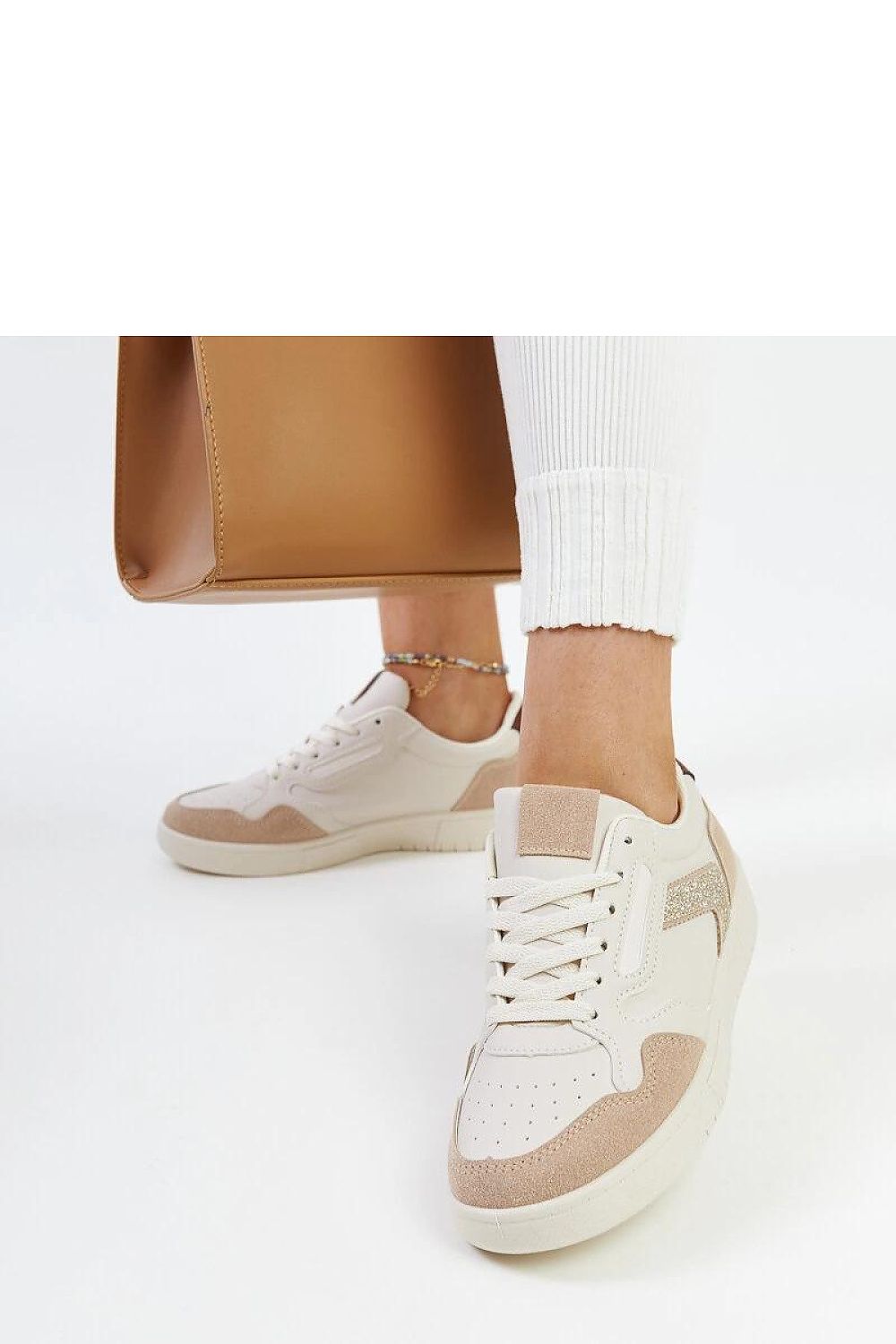 Solea women's glitter sneakers in classic black-and-white, featuring a chic low-cut design and comfort-driven rubber soles, ideal for daywear and special events.