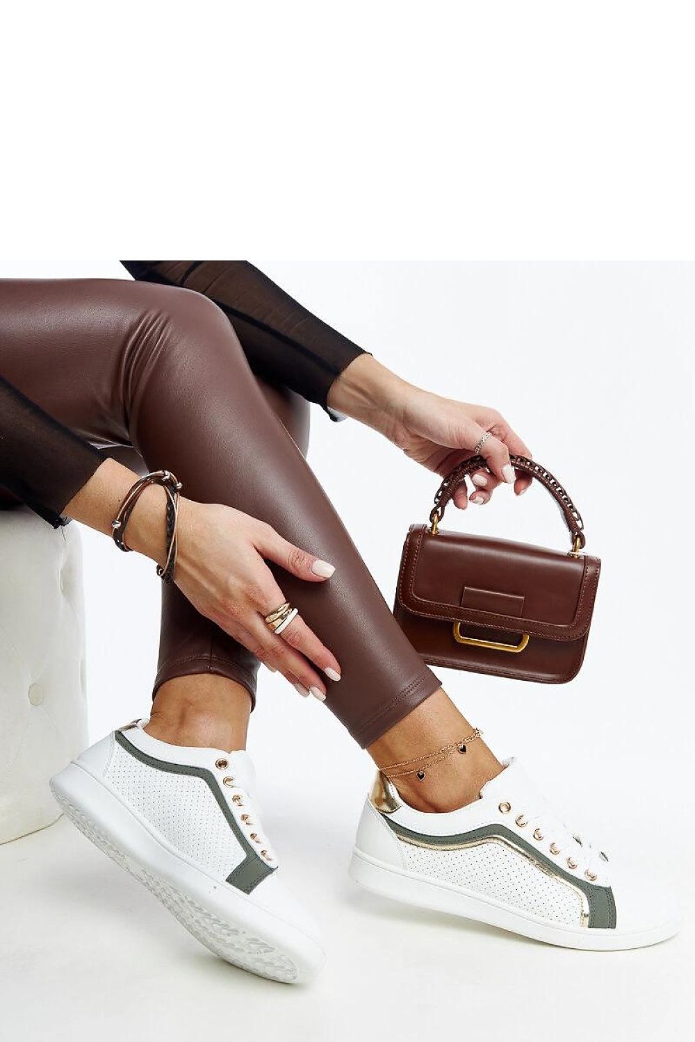 Solea Eco Leather white and green platform sneakers styled elegantly for luxury summer fashion, showcasing faux leather upper and rubber sole.