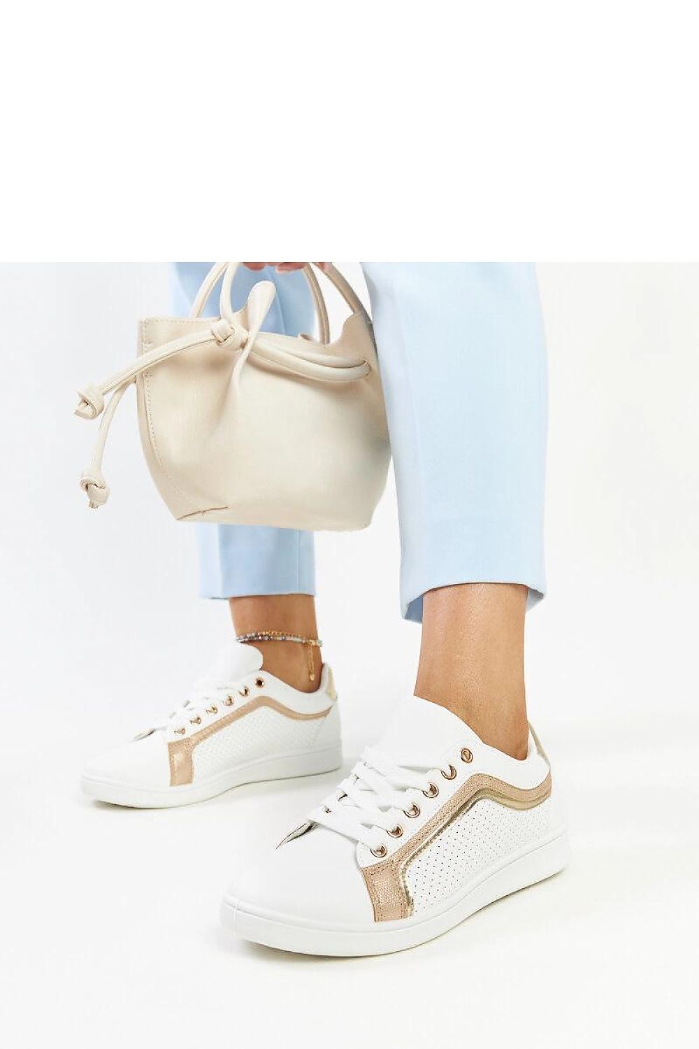 Solea green and white platform sneakers from the side, illustrating their modern silhouette and luxurious eco leather finish.
