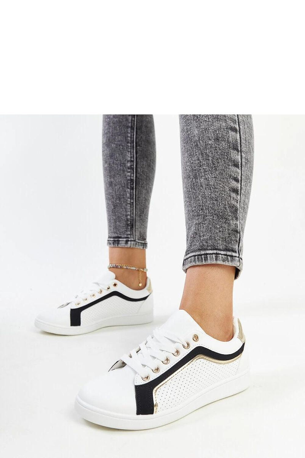 Aesthetic image of Solea Eco Leather White and Green Platform Sneakers against a soft background, emphasizing their trendy style and versatile appeal.