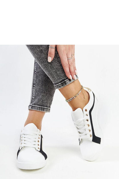 The Solea Eco Leather White and Green Platform Sneakers displayed elegantly, illustrating the unique character and sophistication of the footwear.