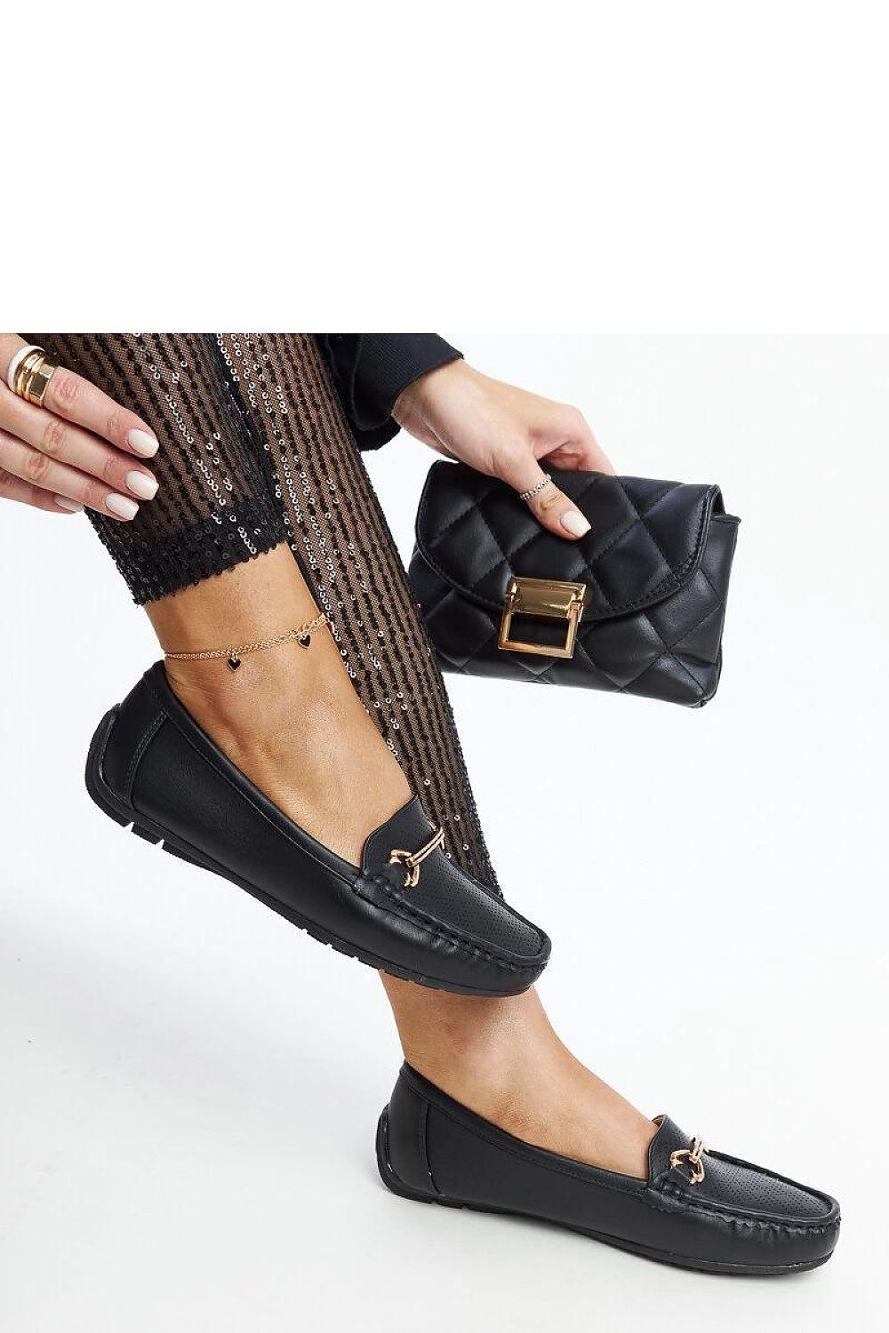 Luxurious Solea black loafers made from eco-leather, with a beautiful decorative buckle and comfortable rubber sole, ideal for spring and summer.