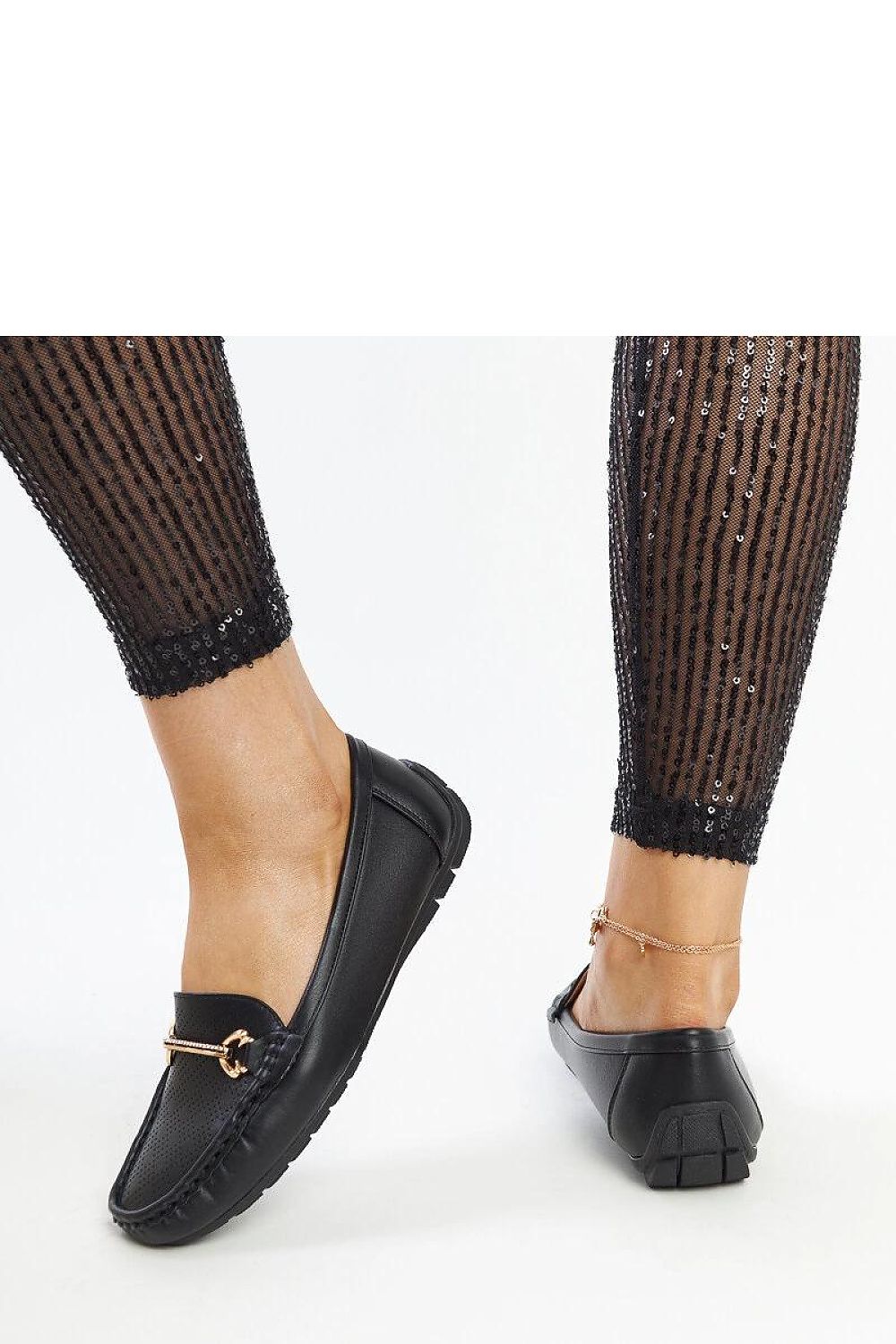 Sophisticated black loafers from Solea with a stylish almond-shaped toe and rhinestone buckle, perfect for chic women's fashion.