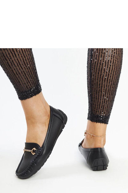 Sophisticated black loafers from Solea with a stylish almond-shaped toe and rhinestone buckle, perfect for chic women's fashion.