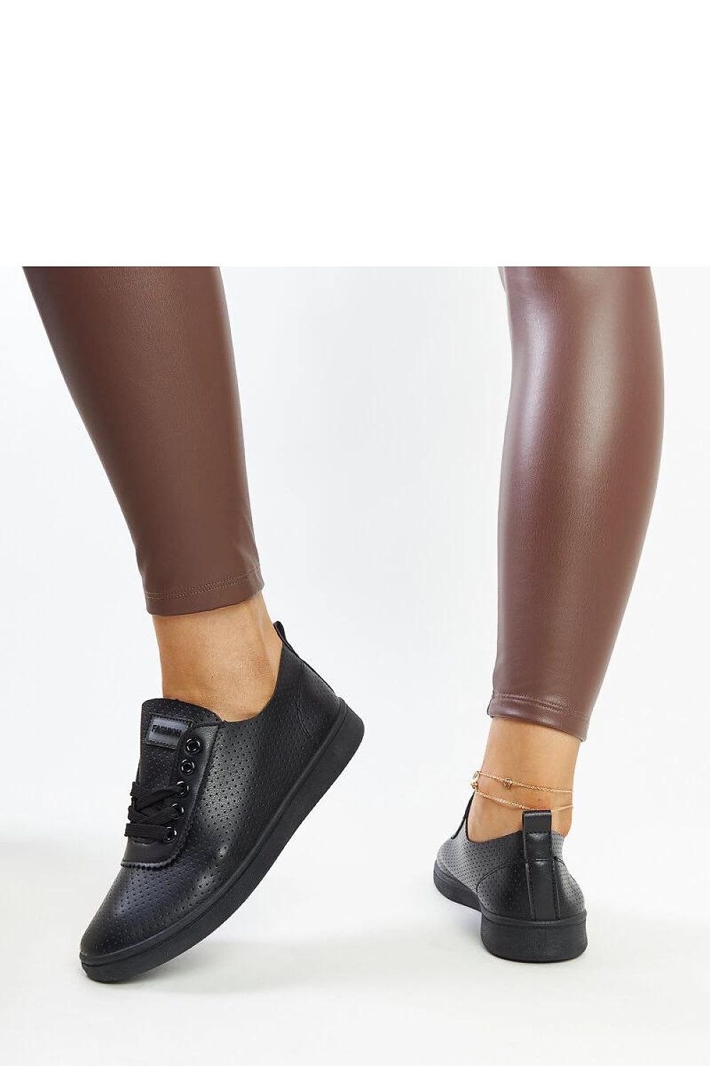 Elegant luxury eco-leather black sneakers for women from Solea, designed for summer comfort and style.