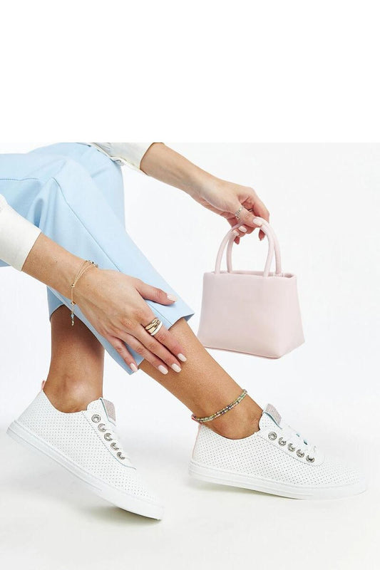 Luxury white eco-leather sneakers by Solea, showcasing a contemporary design with a round toe, perfect for summer style.