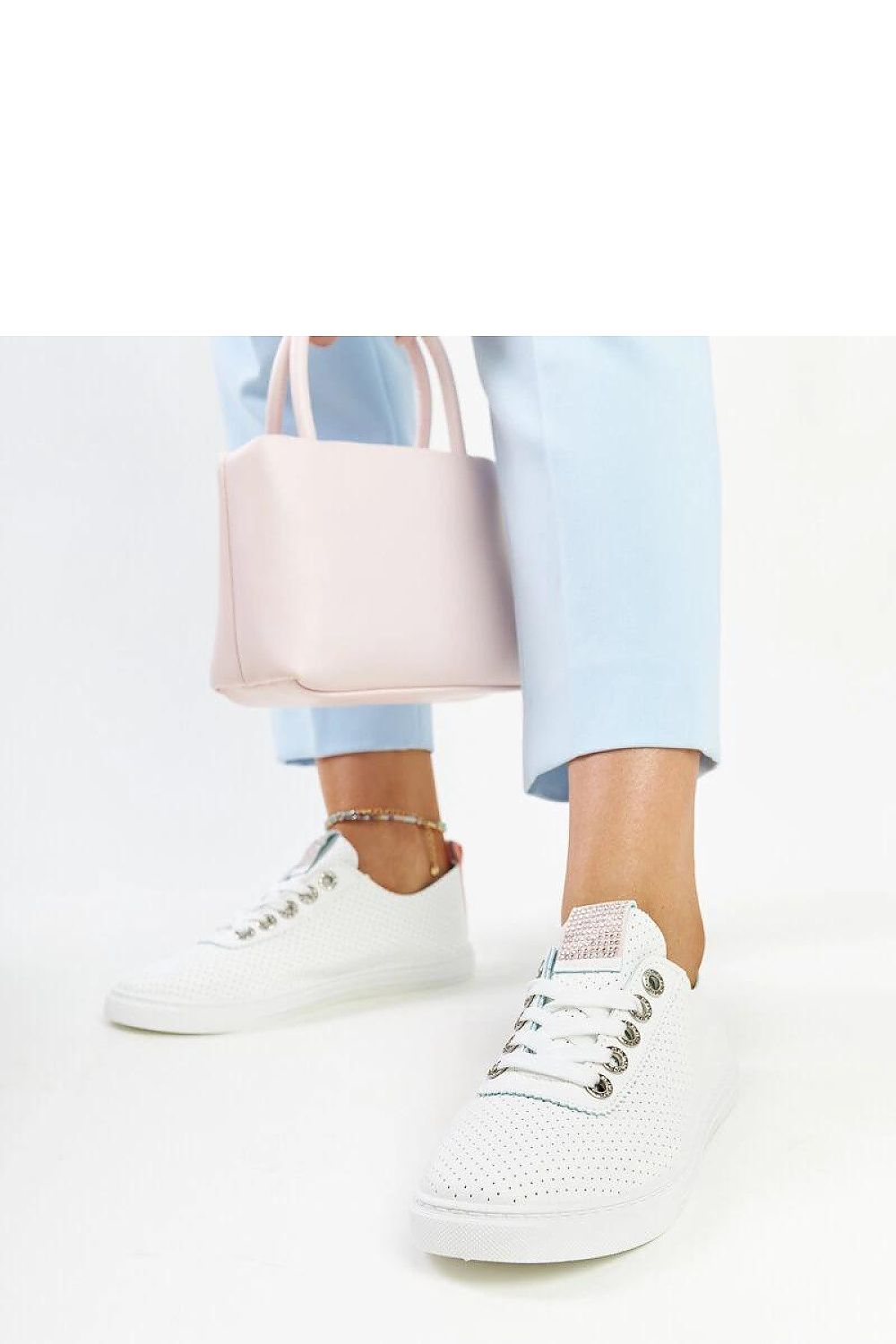 Close-up of Solea's luxury eco-leather sneakers, highlighting the high-quality fabric and lace-up closure for enhanced comfort.