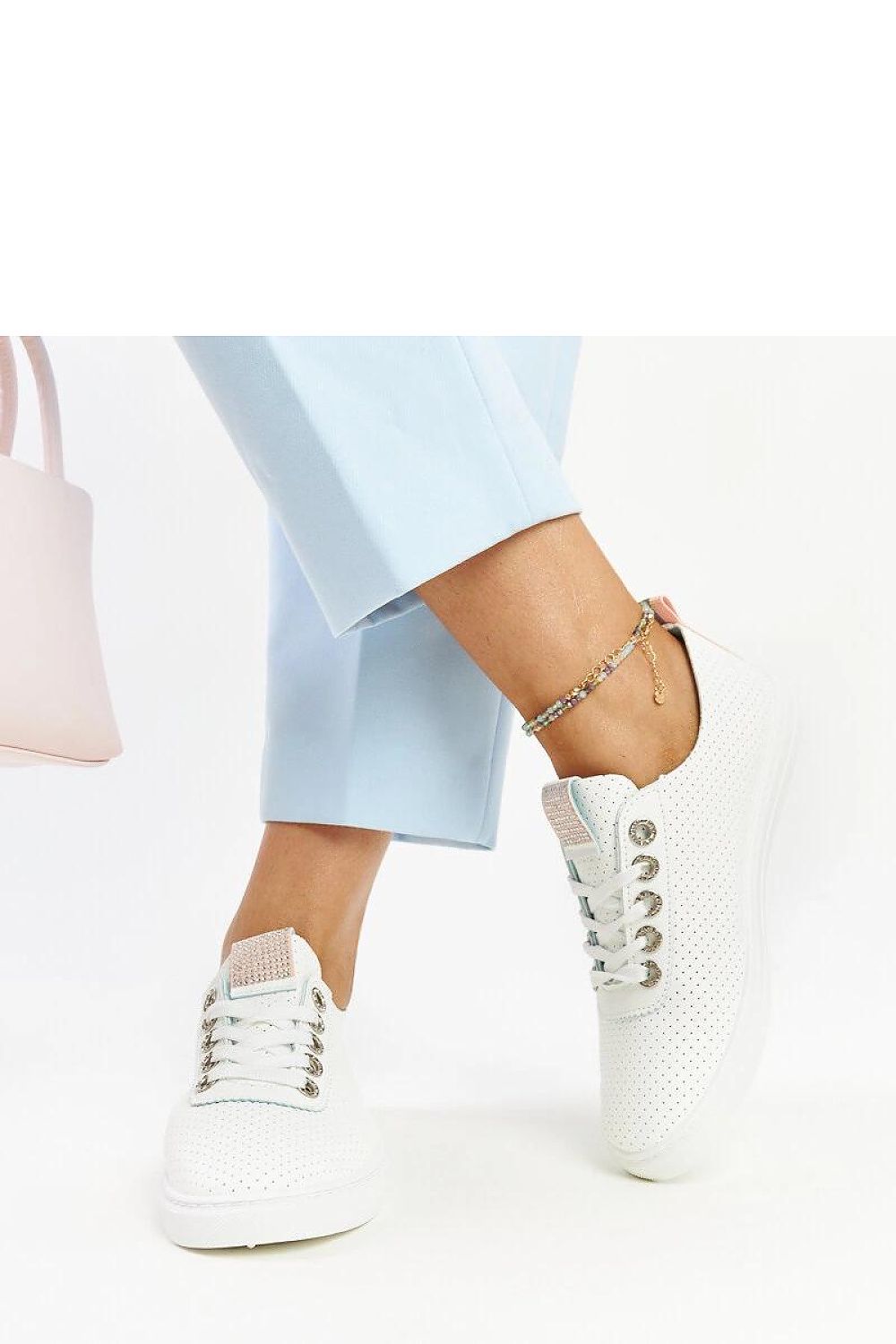 Stylish white eco-leather sneakers by Solea, featuring white soles and a modern aesthetic ideal for warm weather.