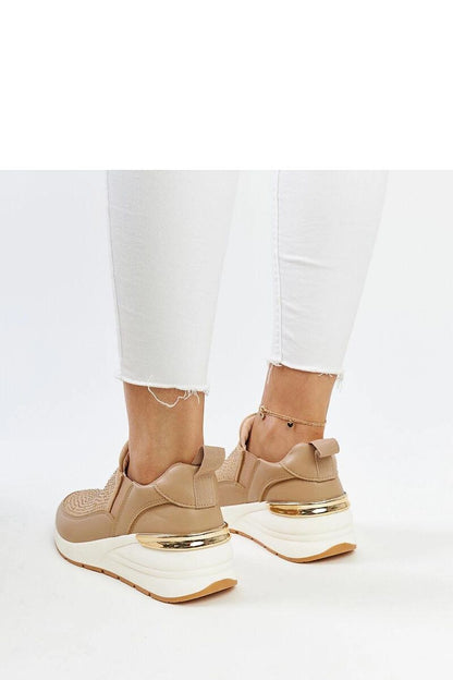 Chic and comfortable brown wedge sneakers by Solea with slip-on design, ideal for fashionable women seeking comfort and elegance.