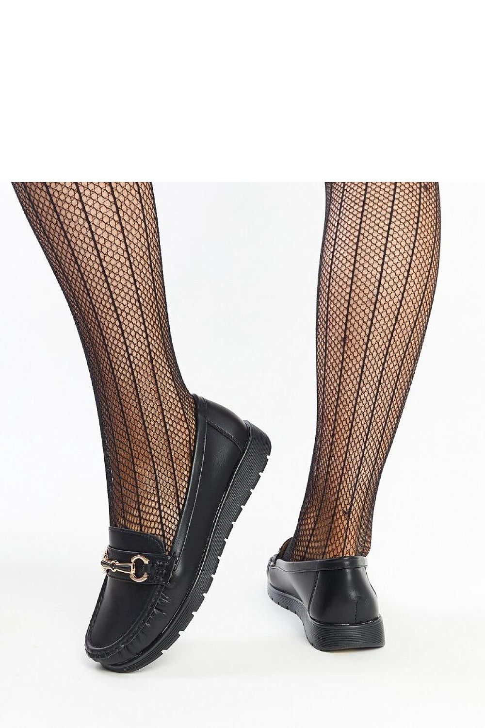 Side profile of Solea black Anisah loafers, featuring a low height heel and modern silhouette, exemplifying luxury and comfort for discerning fashion lovers.