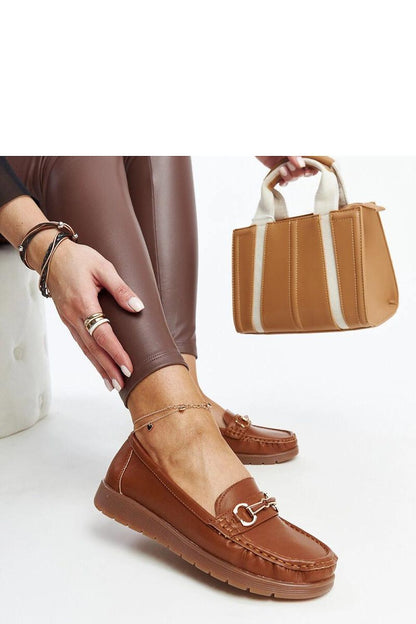 Luxurious eco leather black loafers by Solea, the Anisah model, offering a timeless style with a refined buckle detail, suitable for any elegant occasion.