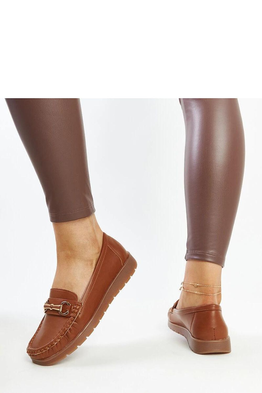 Solea elegant black Anisah loafers crafted from eco leather, showcasing a modern slip-on design with a stylish buckle detail, perfect for sophisticated occasions.