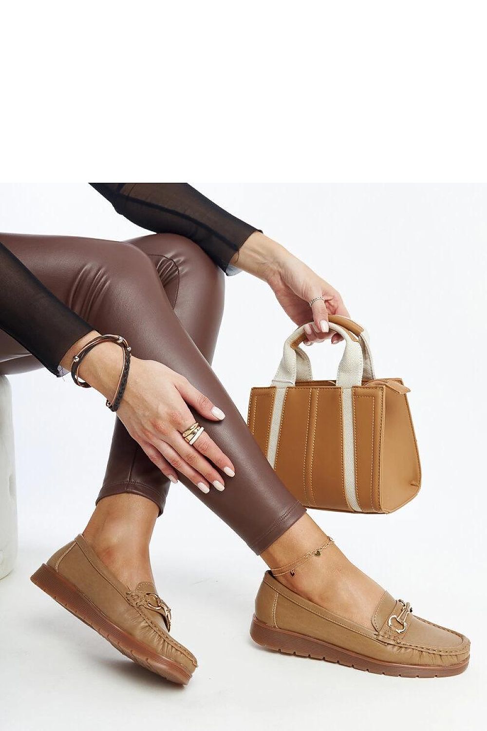 Solea black Anisah loafers featuring a 3 cm heel, elegantly designed for comfort and style, perfect for fashion-forward women.