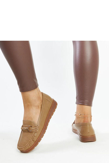 A stylishly arranged collection of Solea Anisah black loafers in eco leather, emphasising durability and modern elegance for daily wear.